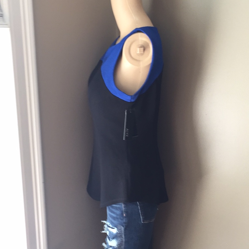 Royal blue/ black peplum top. NWT